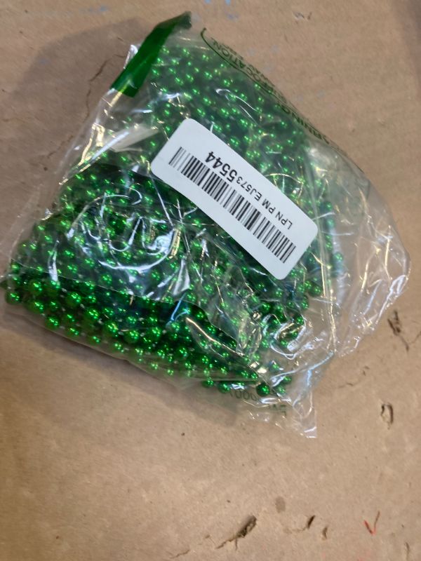 Photo 1 of SHAOQINLIN 12 PCS St. Patricks Day Bead Necklace, 33" Green Mardi Gras Beads Christmas Necklaces Irish Saint Patrick's Necklaces for St. Patricks Day Mardi Gras Parade Throws Birthday Party Favors