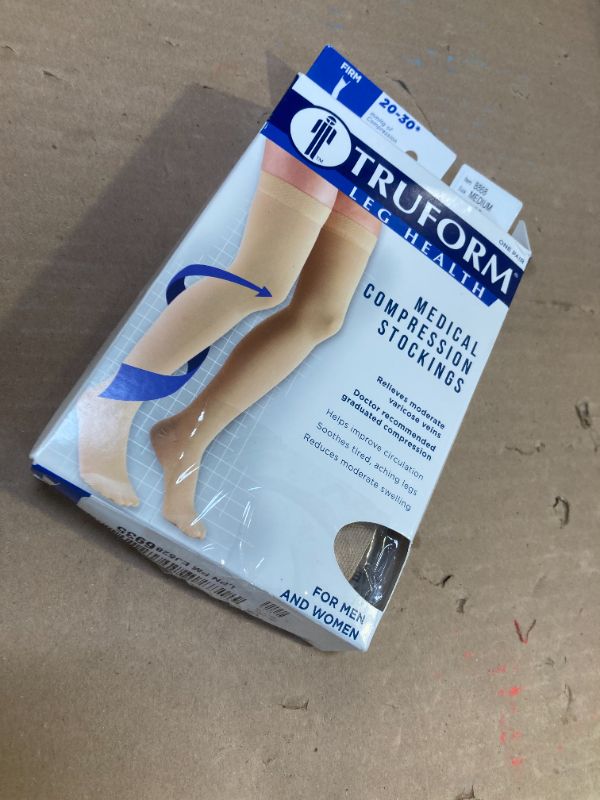 Photo 1 of Truform 20-30 Mmhg Compression Stockings for Men & Women, Thigh High Length, Dot Top, Closed Toe, Beige, Medium
