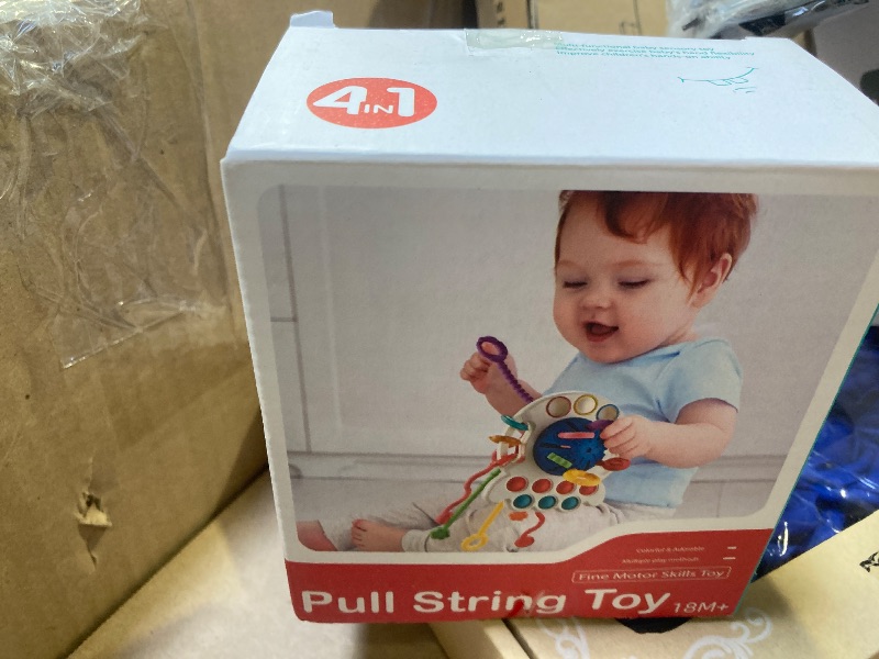 Photo 1 of AiTuiTui Sensory Baby Teething Toys 6 to 12 Months, Infant Toddler Travel Toys for 1 2 Year Old Boy Girl Birthday Gifts, Soft String Fidget Educational Learning for 9 10 18 Months, Blue
