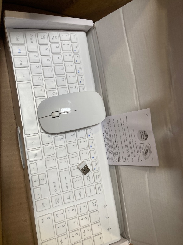 Photo 1 of Wireless Keyboard and Mouse Ultra Slim Combo, TopMate 2.4G Silent Compact USB 2400DPI Mouse and Scissor Switch Keyboard Set with Cover, 2 AA and 2 AAA Batteries, for PC/Laptop/Windows/Mac - White
