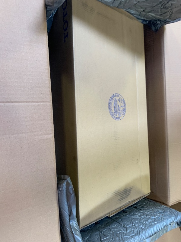 Photo 1 of TOTO Drake Transitional Two-Piece Elongated 1.28 GPF Universal Height TORNADO FLUSH Toilet with CEFIONTECT, Cotton White - CST786CEFG#01