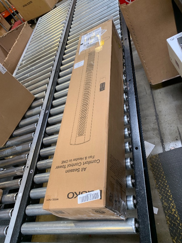 Photo 1 of Lasko Oscillating All Season Tower Fan and Space Heater in One for Home with Adjustable Thermostat, Overheat Protection, 4 Fan Speeds, 3 Heat Settings and Remote, 42 Inches, 1500W, Gray, FH515
