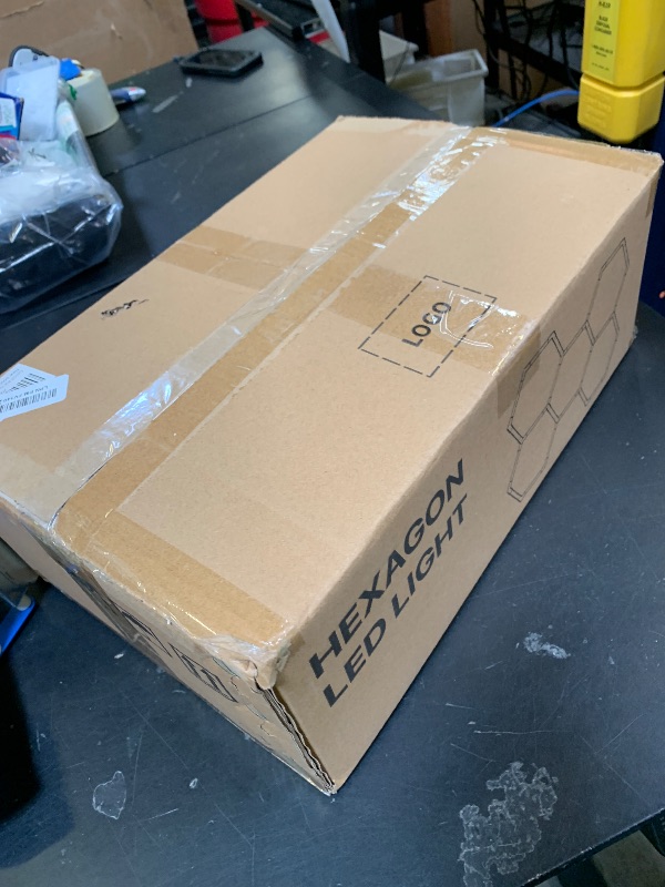 Photo 1 of CyanCliff RGB Hexagon LED Light 5-Grid | Hexagon Garage Lights | 356 Color Modes | Music Sync | Smart App & Remote Control | Gaming Room Garage Bedroom Lighting