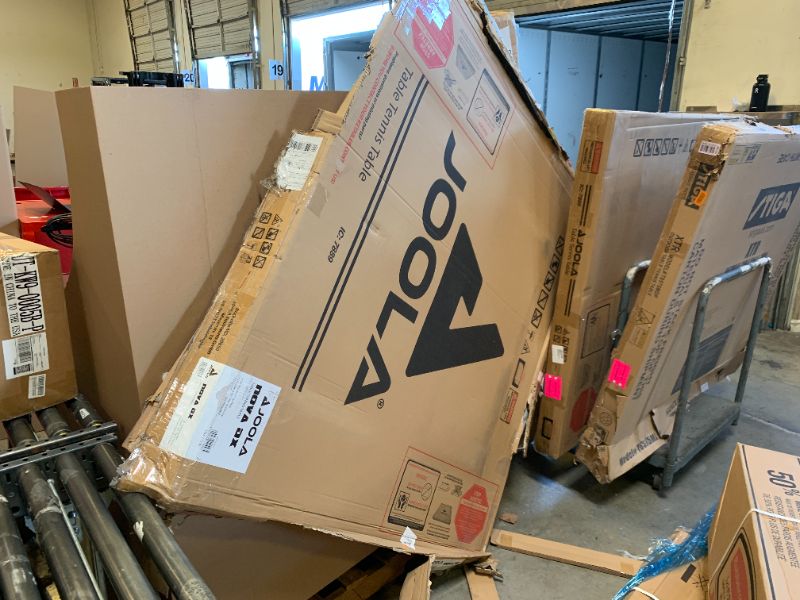 Photo 1 of JOOLA NOVA DX Indoor/Outdoor Table Tennis Table with Weatherproof Net Set