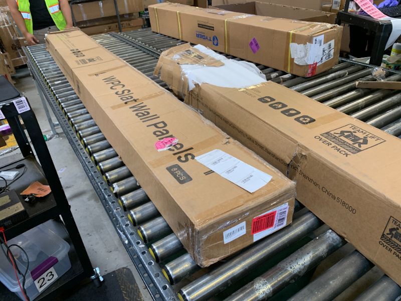 Photo 1 of LARWORKS WPC Slat Wall Panels 8 Pack 96" x 8.2", Waterproof Fluted Wall Paneling, Accent 3D Wall Panel for Wall Decor, Bathroom, Bedroom, Office - Widen Low Grille Elm (Cover Approx.44 sq.ft)