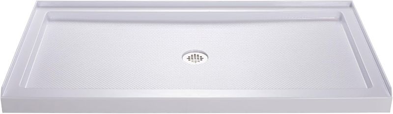 Photo 1 of DreamLine SlimLine 32 in. D x 54 in. W x 2 3/4 in. H Center Drain Single Threshold Shower Base in White, DLT-1132540
