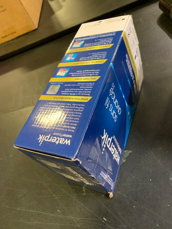 Photo 1 of Waterpik Cordless Advanced 2.0 Water Flosser For Teeth, Gums, Braces, Dental Care With Travel Bag and 4 Tips, ADA Accepted, Rechargeable, Portable, and Waterproof, White WP-580, Packaging May Vary