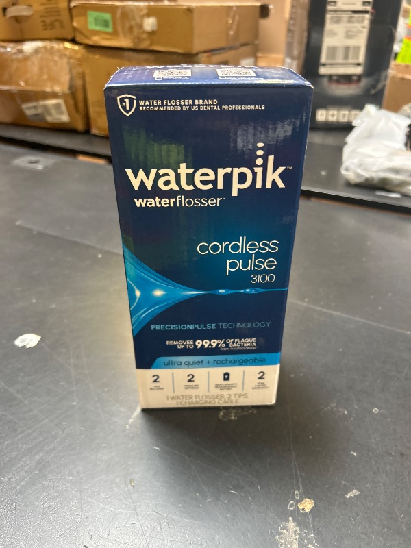 Photo 1 of Waterpik Cordless Pulse 3100 Rechargeable Portable Water Flosser for Teeth, Gums, Braces Care and Travel with 2 Flossing Tips, Waterproof for Shower Use, ADA Accepted, WF-20 White, Amazon Exclusive
