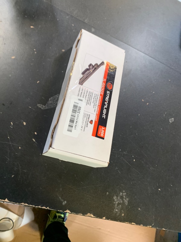 Photo 1 of Streamlight 69600 TL-Racker 1,000-Lumen 20,000-Candela Tactical Integratd Forend Weapon Light with Ambidextrous Controls for Mossberg 500/590 Models Only, Black