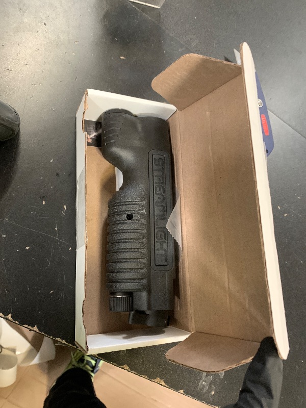 Photo 1 of Streamlight 69600 TL-Racker 1,000-Lumen 20,000-Candela Tactical Integratd Forend Weapon Light with Ambidextrous Controls for Mossberg 500/590 Models Only, Black