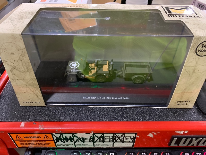 Photo 1 of 1:43 Scale Willys Jeep 1/4-Ton Utility Truck with Trailer - Militaria Diecast by Motorcity Classics
