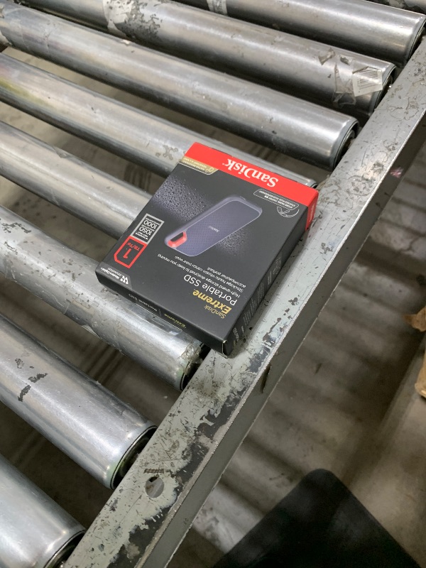 Photo 1 of SanDisk 1TB Extreme Portable SSD - Up to 1050MB/s, USB-C, USB 3.2 Gen 2, IP65 Water and Dust Resistance, Updated Firmware - External Solid State Drive - SDSSDE61-1T00-G25