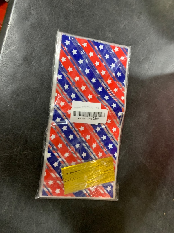 Photo 1 of Lhocm 4th of July Treat Bags - 100 Pcs Happy Patriotic Day Plastic Cellophane Bag, Clear Fourth of July Gift Goodie Candy Favor Bags with Gold Twist Ties for Independence Day Party Favors Supplies