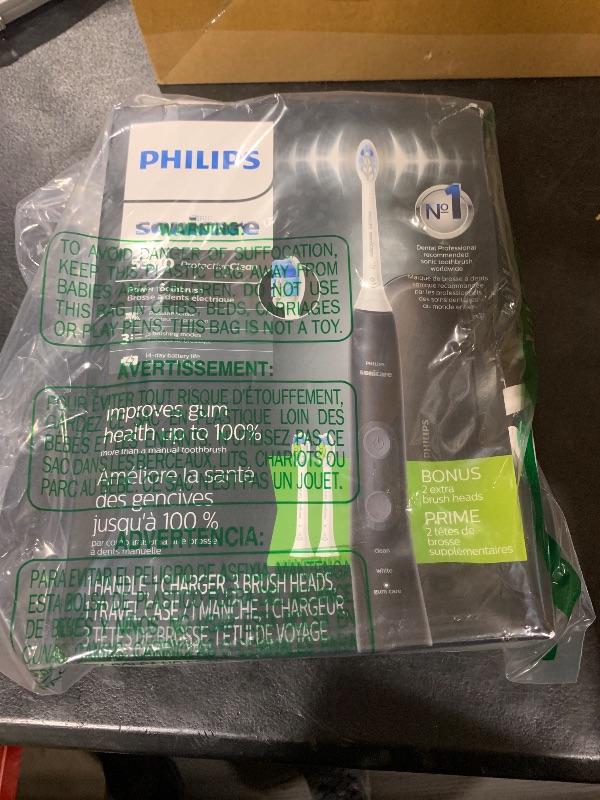 Photo 1 of Philips Sonicare ProtectiveClean 5300 Rechargeable Electric Toothbrush, with Pressure Sensor, 3 Cleaning Modes, SmarTimer and QuadPacer, with 2 Bonus Brush Heads, Travel Case, Black, Model HX6423/34