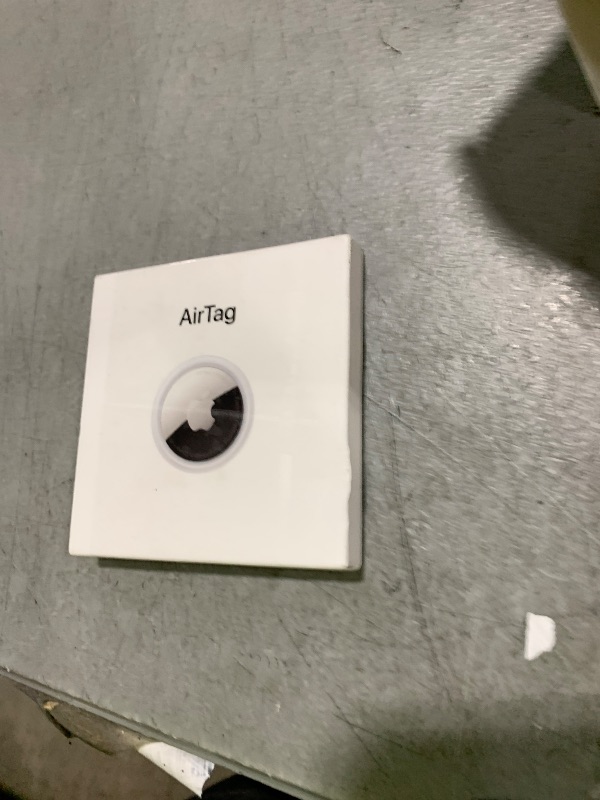 Photo 1 of Apple AirTag. Keep Track of and find Your Keys, Wallet, Luggage, Backpack, and More. Simple one-tap Set up with iPhone or iPad