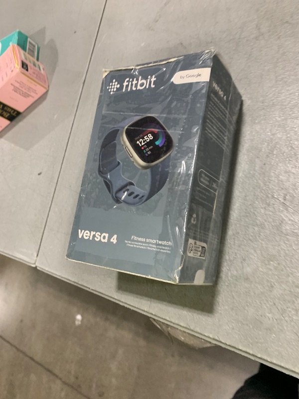 Photo 1 of Fitbit Versa 4 Fitness Smartwatch with Daily Readiness, GPS, 24/7 Heart Rate, 40+ Exercise Modes, Sleep Tracking and more, Waterfall Blue/Platinum, One Size (S & L Bands Included)