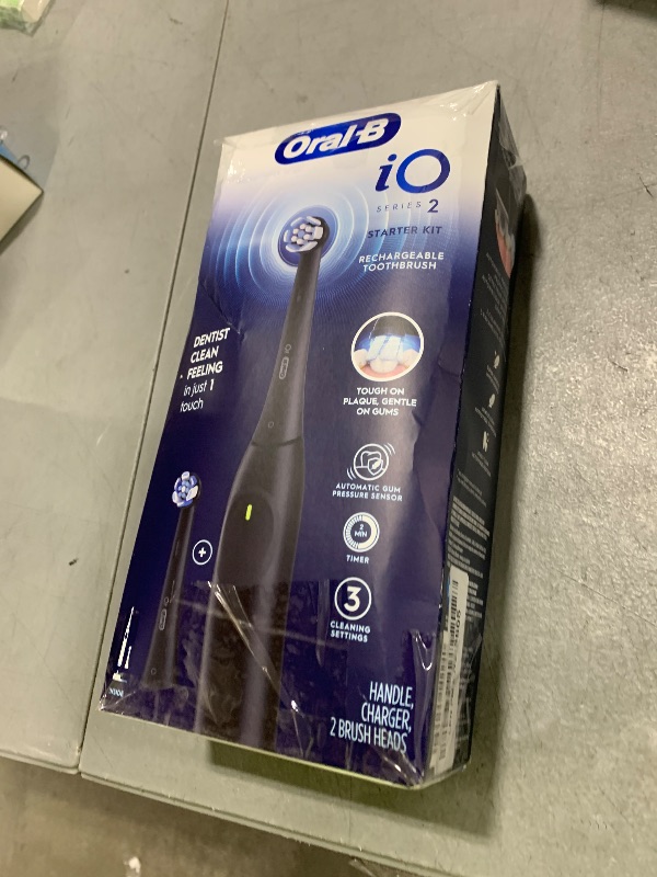 Photo 1 of Oral-B iO Series 2 Rechargeable Electric Powered Toothbrush Starter Kit, Night Black with 2 Brush Heads - Automatic Pressure Sensor to Protect Gums - 3 Modes - 2 Min Timer