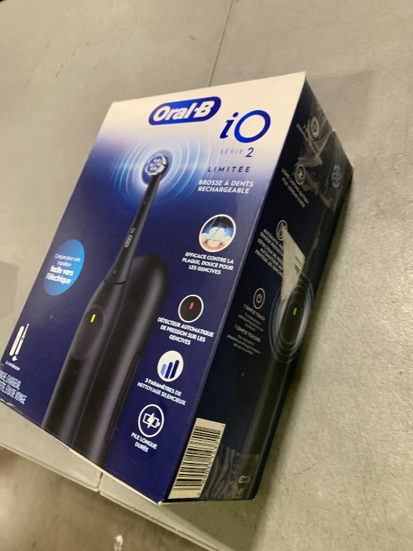 Photo 1 of Oral-B iO Simple Clean Rechargeable Electric Powered Toothbrush, Night Black with 1 Gentle Care Brush Head and 1 Black Travel Case - Automatic Pressure Sensor to Protect Gums - 3 Modes - 2 Min Timer