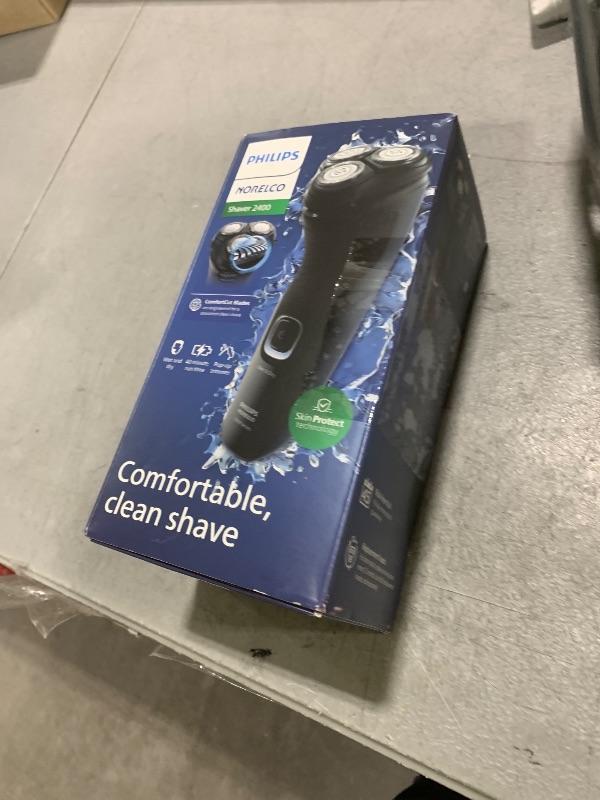 Photo 1 of Philips Norelco Shaver 2400 Series, Wet and Dry Electric Shaver, Pop-up Trimmer, P-Cap, Deep Black, Model X3001/90