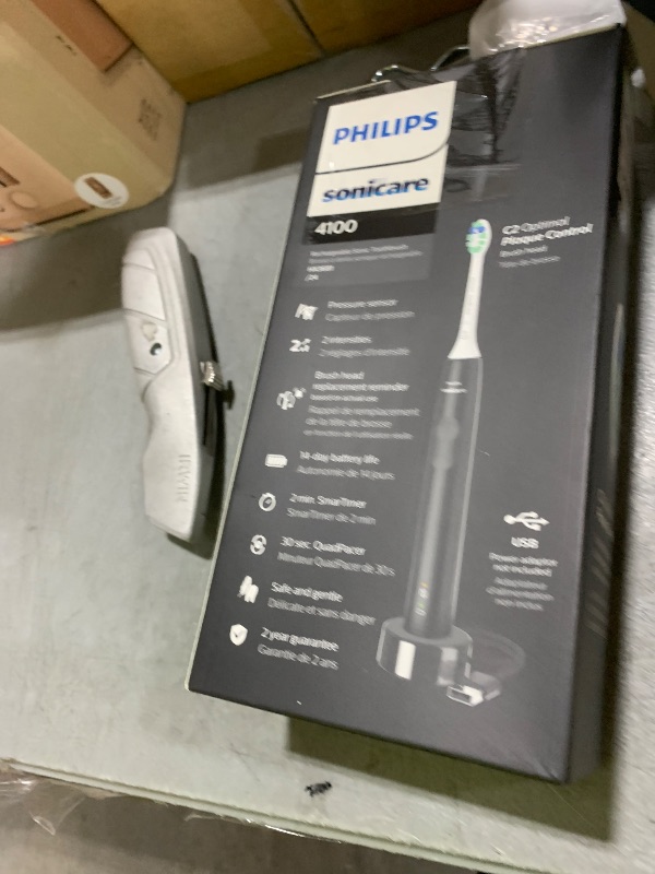 Photo 1 of Philips Sonicare 4100 Rechargeable Electric Toothbrush, with Pressure Sensor, 2 Intensity Settings, SmarTimer and QuadPacer, 14-Day Battery Life, Black, Model HX3681/24