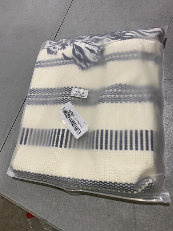 Photo 1 of Smile Bee Boho Outdoor Couch Throw Pillow Covers Set of 2 Decorative Lumbar Thick Woven Striped Accent Neutral Pillow Covers with Tassels for Bed Sofa Home Decor 12x20 Inch, Navy Blue and Cream White
