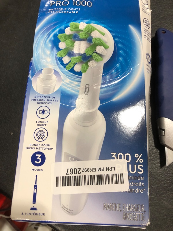 Photo 1 of Oral-B Pro 1000 Rechargeable Electric Toothbrush, White