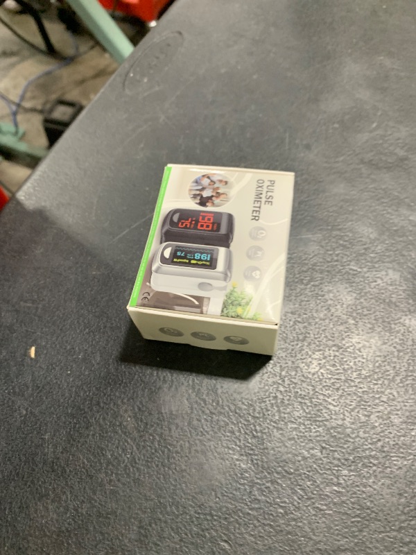 Photo 1 of Pulse Oximeter Fingertip- Mini Oximeter Oxygen Saturation Monitor for SpO2/Heart Rate/PI, with Auto Graph Display