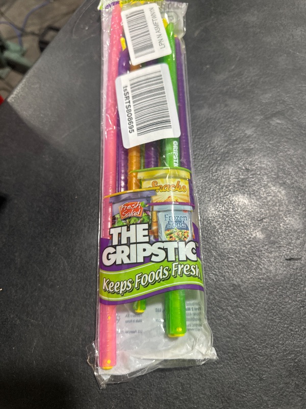 Photo 1 of GripStic 12pc Assorted Bag Clips. Durable and reusable chip clips seal food bags air tight. Set includes: (2) 5" Blue, (3) 7.25" Purple, (3) 8.75" Orange, (3) 11.25" Green, (1) 13" Pink.