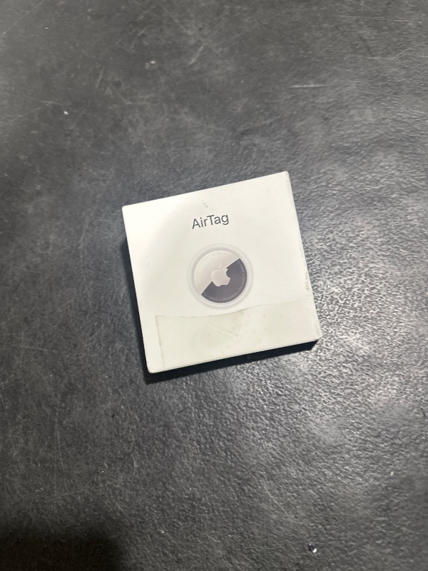 Photo 1 of Apple AirTag. Keep Track of and find Your Keys, Wallet, Luggage, Backpack, and More. Simple one-tap Set up with iPhone or iPad