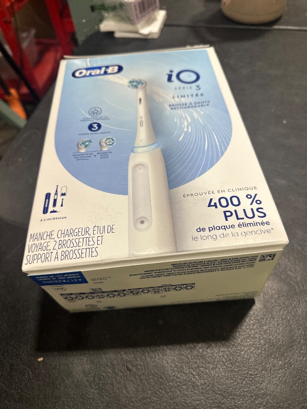 Photo 1 of Oral-B iO Deep Clean Rechargeable Electric Powered Toothbrush, White with iO Series 3 Limited, 2 Brush Heads and Travel Case - Pressure Sensor to Protect Gums - 3 Cleaning Settings - 2 Minute Timer