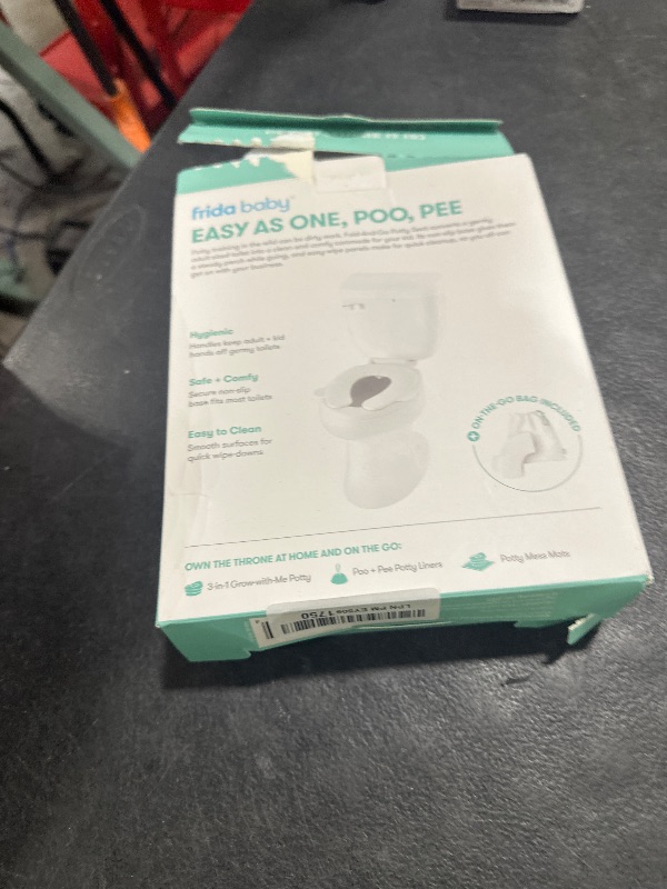 Photo 1 of Frida Baby Fold-and-Go Portable Potty Seat for Toilet, Foldable Travel Potty Seat for Toddler, Fits Round & Oval Toilets, Non-Slip Base, Handles, Includes Free Travel Bag
