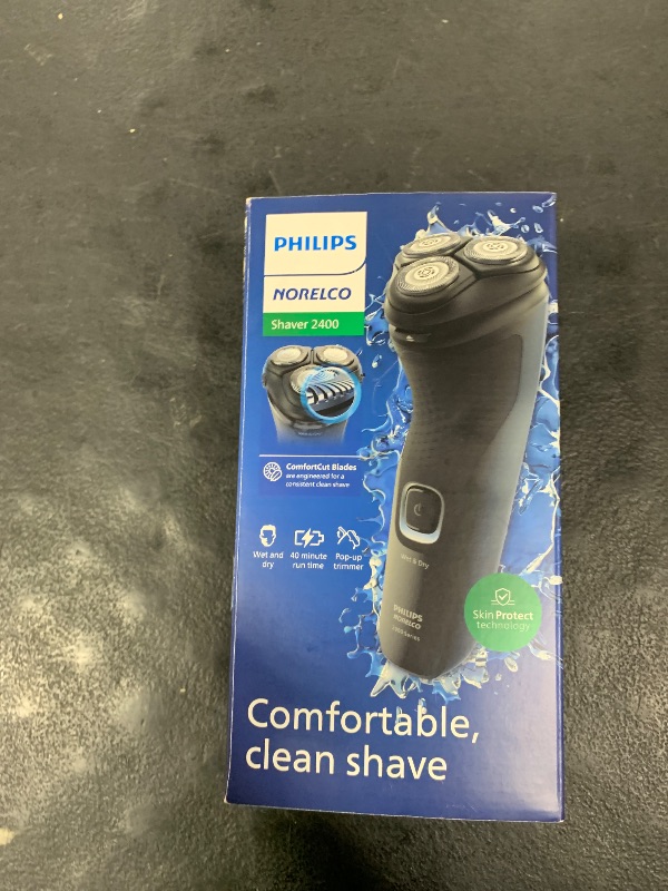 Photo 1 of Philips Norelco Shaver 2400 Series, Wet and Dry Electric Shaver, Pop-up Trimmer, P-Cap, Deep Black, Model X3001/90