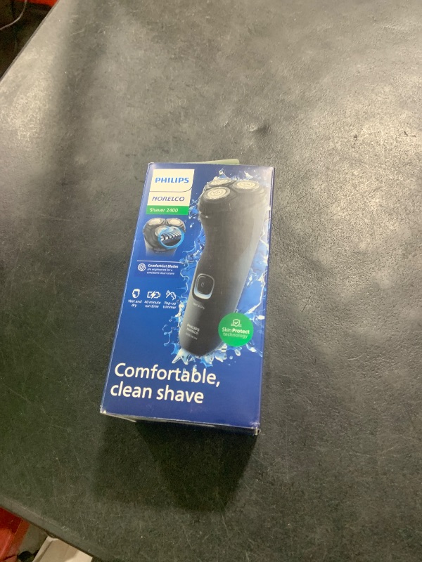 Photo 1 of Philips Norelco Shaver 2400 Series, Wet and Dry Electric Shaver, Pop-up Trimmer, P-Cap, Deep Black, Model X3001/90