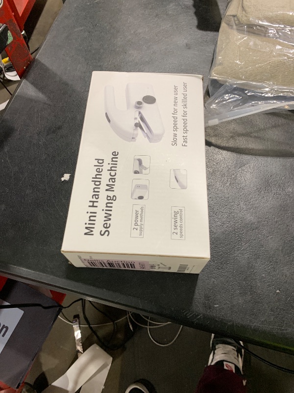 Photo 1 of Handheld Sewing Machine,Two dear,Mini sewing machine,Easy to Use and Fast Stitch Suitable for Clothes,Fabrics, DIY Home Travel Electric Handheld Sewing Machine for Beginners.