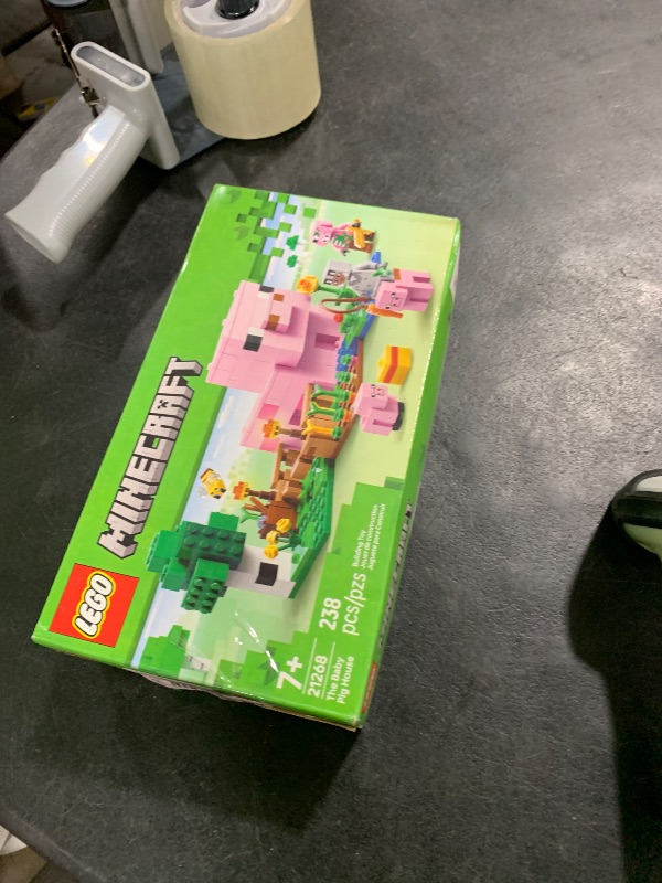 Photo 1 of LEGO Minecraft The Baby Pig House Toy Figures and Playset - Building Minecraft Toy for Kids, Boys and Girls, Ages 7+ - Gift for Birthdays - with 2 Minifigures for Pretend Play - 21268