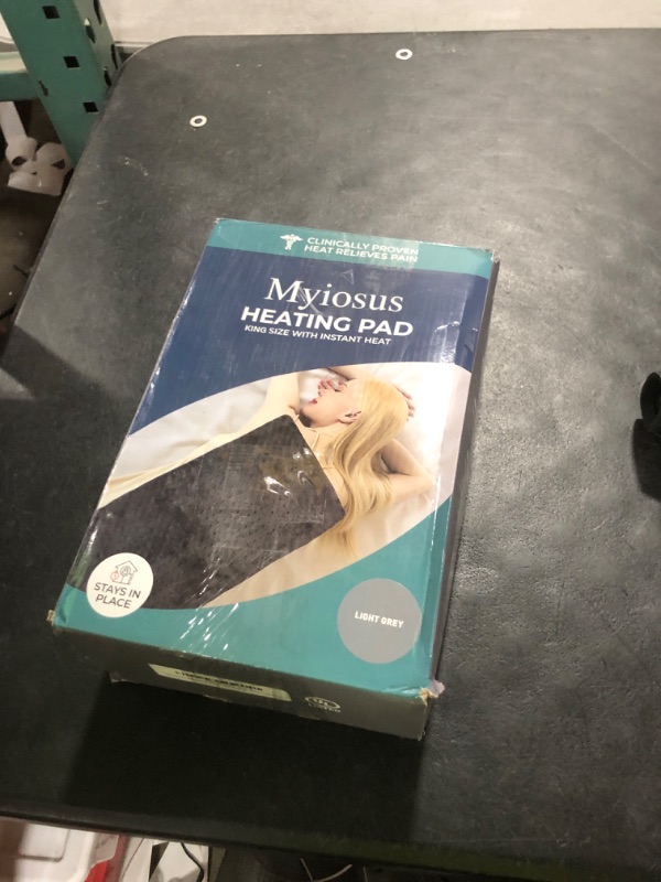 Photo 1 of Massaging Weighted Heating Pad for Back Pain Relief,Heating Pads for Neck, Shoulder,Cramp,Portable Heated Pad with 3 Heat Settings & 6 Massage,18 Relaxing Combinations,Auto Off,12"*24",Light Grey