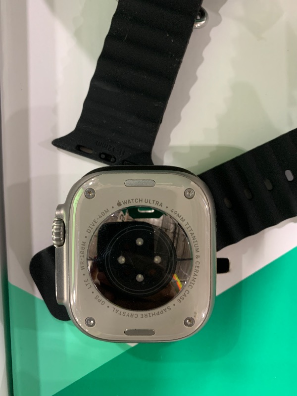 Photo 1 of Apple Watch Ultra [GPS + Cellular 49mm] Titanium Case with Midnight Ocean Band, One Size (Renewed Premium)