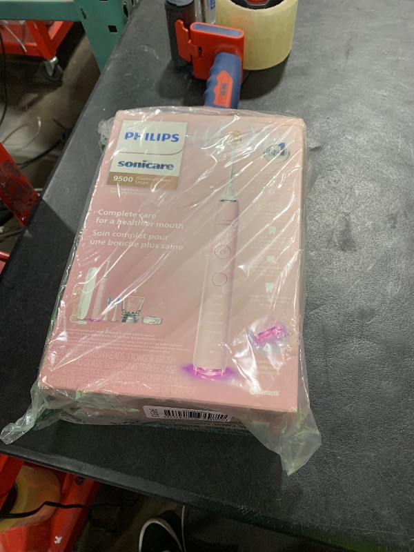 Photo 1 of Philips Sonicare DiamondClean Smart 9500 Electric Toothbrush, Sonic Toothbrush with App, Pressure Sensor, Brush Head Detection, 5 Brushing Modes and 3 Intensity Levels, Pink, Model HX9923/21