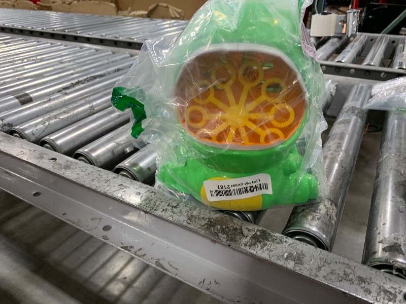 Photo 1 of JOYIN Dinosaur Bubble Machine, Bubble Machine Gun Blower with Solutions for Kids, Summer Outdoor Indoor Toy, Dinosaur Party Favor, Kids Birthday Gift (Green)