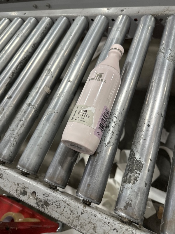 Photo 1 of Stanley All Day Slim Bottle 20 oz | Twist On Lid with Leakproof Seal | Slim Design for Travel & Gym | Insulated Stainless Steel | BPA-Free | Rose Quartz