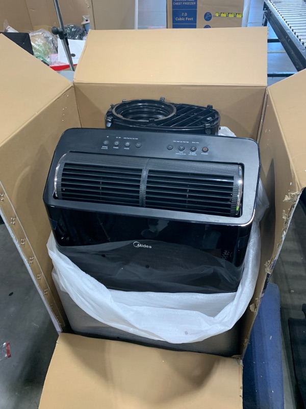 Photo 1 of Midea Duo 14,000 BTU (12,000 BTU SACC) High Efficiency Inverter Ultra Quiet Portable Air Conditioner, with Heat up to 550 Sq. Ft., Works with Alexa/Google Assistant, with Remote Control & Window Kit