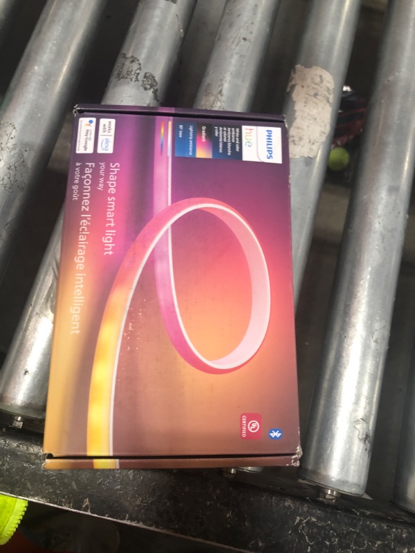 Photo 1 of Philips Hue Indoor 6-Foot Smart LED Light Strip Base Kit with Plug - Flowing Multicolor Effect - 1 Pack - Control with Hue App - Works with Alexa, Google Assistant and Apple HomeKit