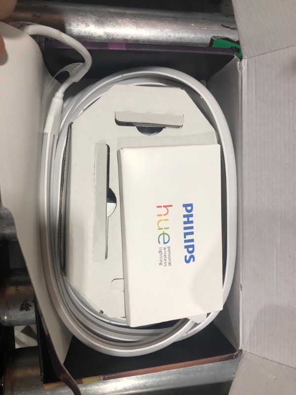 Photo 1 of Philips Hue Indoor 6-Foot Smart LED Light Strip Base Kit with Plug - Flowing Multicolor Effect - 1 Pack - Control with Hue App - Works with Alexa, Google Assistant and Apple HomeKit
