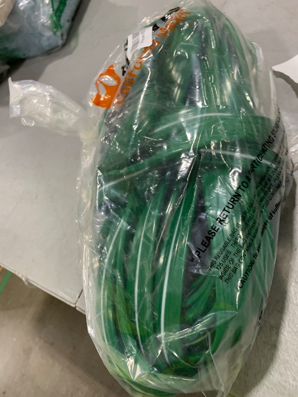 Photo 1 of Jin&Bao Sprinkler Hose with Holes 50FT, Heavy Duty Watering Garden Hose, High-Efficiency Sprinklers System for Lawn and Garden with Staples