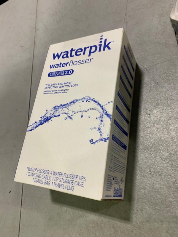 Photo 1 of Waterpik Cordless Advanced 2.0 Water Flosser For Teeth, Gums, Braces, Dental Care With Travel Bag and 4 Tips, ADA Accepted, Rechargeable, Portable, and Waterproof, White WP-580, Packaging May Vary