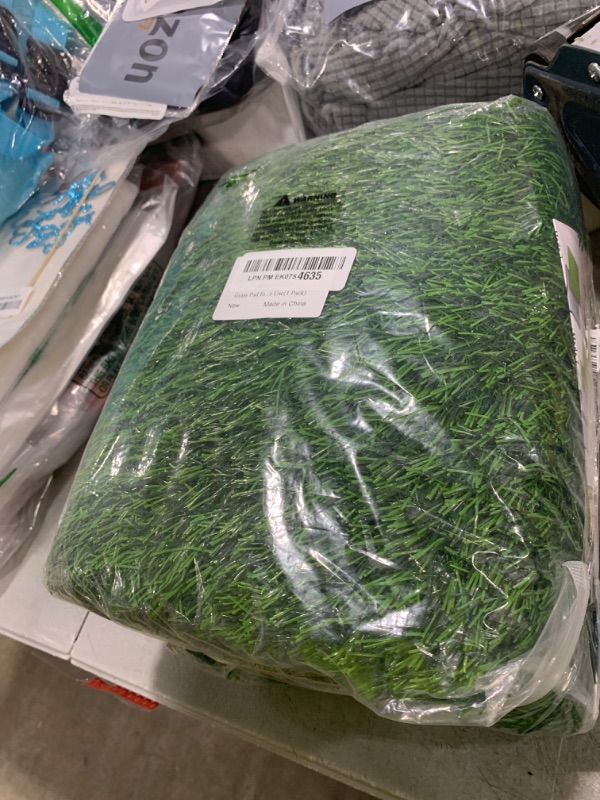 Photo 1 of Pad For Dogs 39.3 x 31.5 inches Strong Absorbency Soft Artificial Grass for Pets Potty Training, Easy to Clean Fake Grass for Dog Indoor Outdoor Use(1 Pack)
