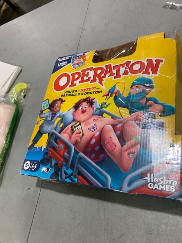 Photo 1 of Operation Electronic Board Game with All-in-One Carrying Case | 2 Ways to Play | Ages 6+ | 1+ Players | 10 Mins. | Fun Kids Games