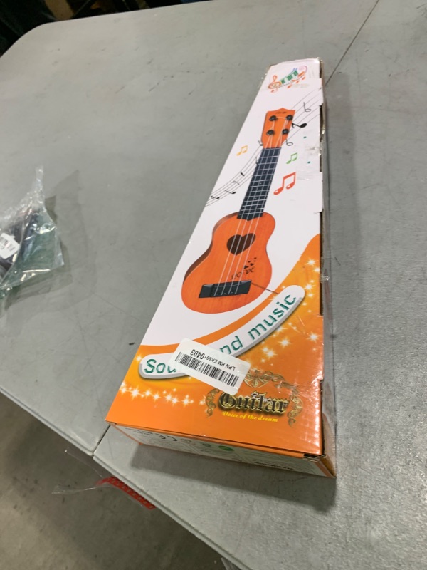 Photo 1 of YEZI Kids Toy Classical Ukulele Guitar Musical Instrument, Brown