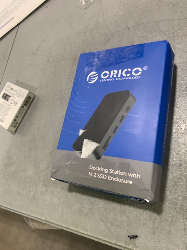 Photo 1 of ORICO 9-in-1 USB C Hub with M.2 NVMe SSD Enclosure 10Gbps, Tool Free Hub Docking Station Adapter with Built-in Fan, Gigabit Ethernet, 100W PD, SD/TF, Type C & USB A for Laptop MacBook Mac mini -M2P7