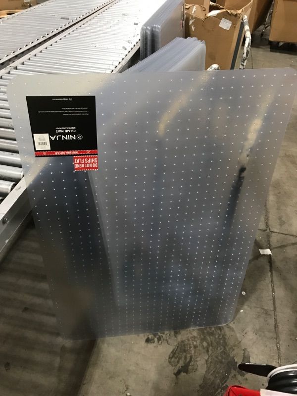Photo 1 of NINJA Easy Glide Office Chair Mat for Carpet Floors, Strong Slip Resistant Under Desk Floor Protector, Stay in Place Plastic Computer Mats for Rolling Work and Gaming Chairs, 32.5x48 Inch, Clear